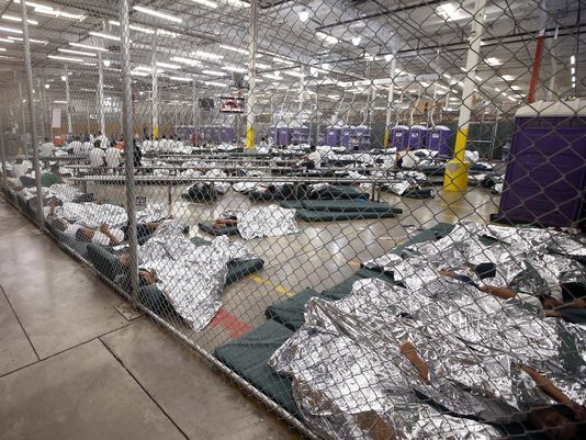 1403126178001-AP-Immigration-Overload-002